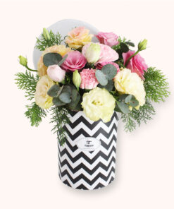 Pastel flower box with peach and pink eustomas